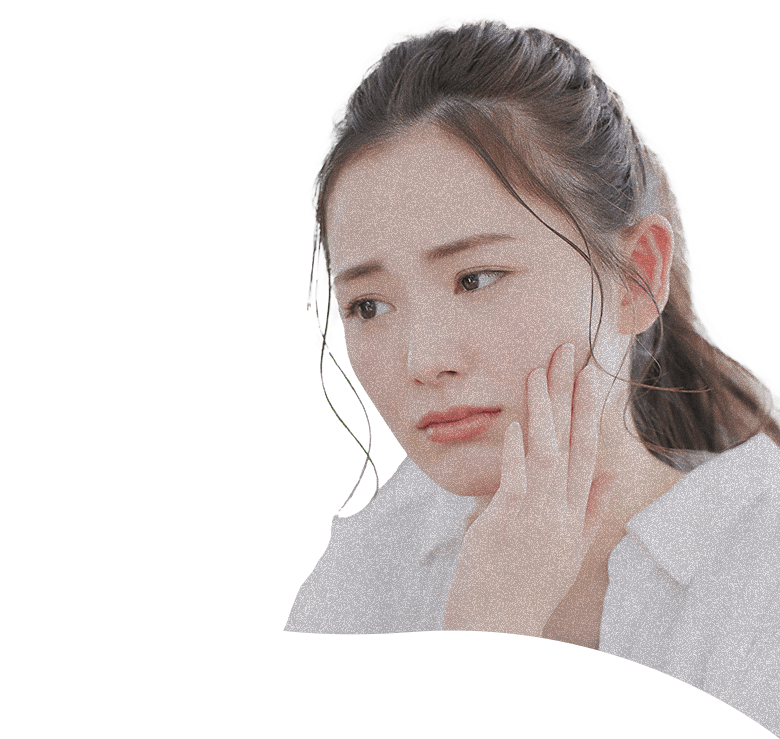悩む女性の写真