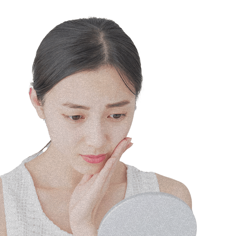 悩む女性の写真